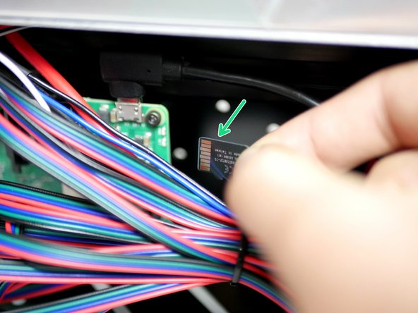 Insert the Micro SD card into the Raspberry Pi.