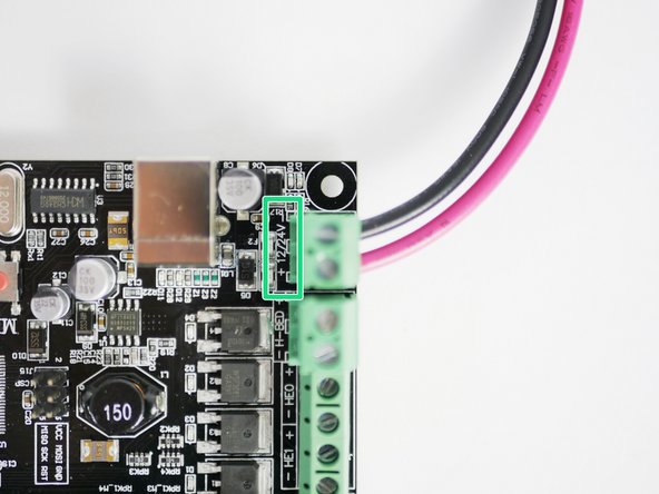 Fix the black and red power cables into the connector on the control board.