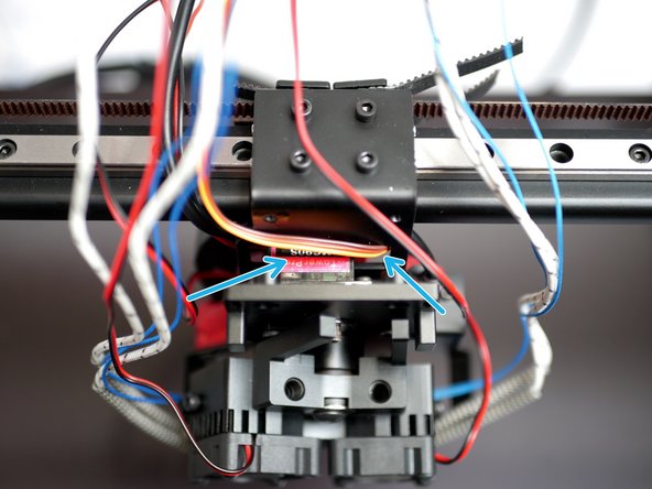 Route the probe cable behind the tool carriage.