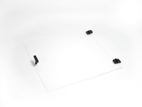 Fix the handle onto the front panel.