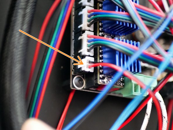 Connect the hotend cooling fan cable to the control board.