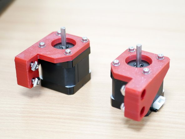 Orientate the motors as shown with the cable connectors facing the side of the mounting holes.