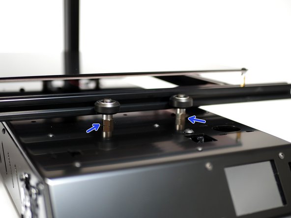 Rotate the front eccentric spacers with a pair of pliers so that the platform assembly slides smooth and stable.