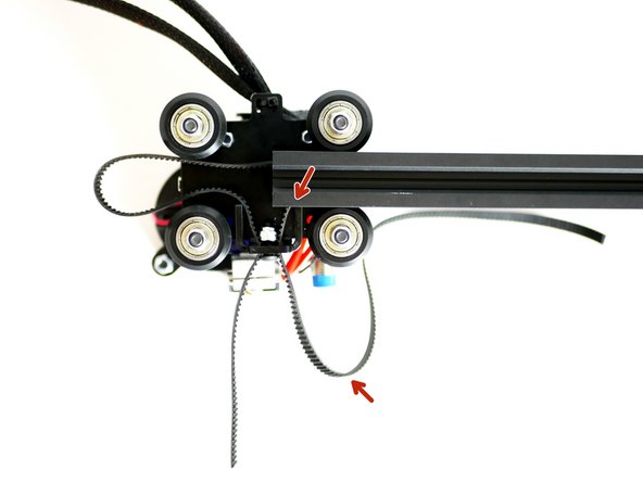 Pull the right side of the belt until it catches against the raised part of the Y-Carriage.