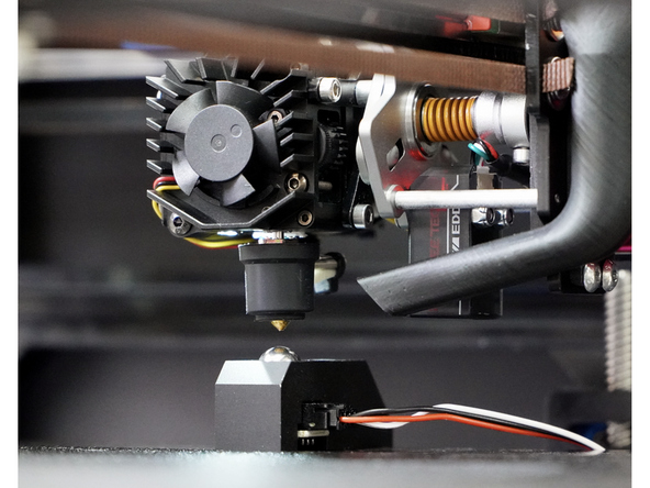 Select the first print head and check that when the nozzle tip is above the ball of the probe the co-ordinates match what has been set in the calibrate-offsets.cfg.