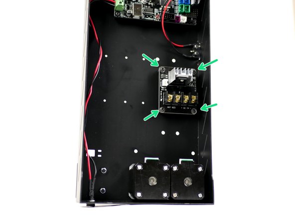 Mount the MOSFET onto the base. Make sure that the power terminals are facing towards the motors.