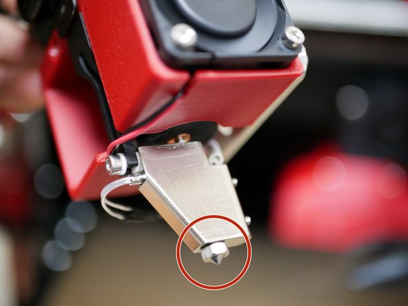 With the hotends hot, re-tighten the nozzles. This is called hot tightening and should be done when a new nozzle is installed to prevent leaks.