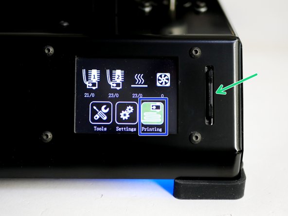 Insert the SD card into the printer.