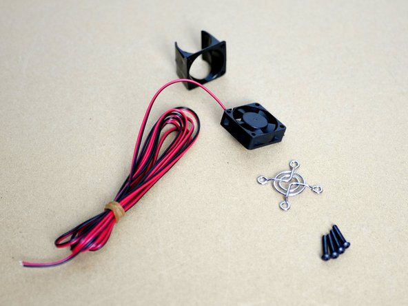 For the Heatsink fan assembly begin by using an M3 x 16mm bolt to thread the holes on the plastic mount.