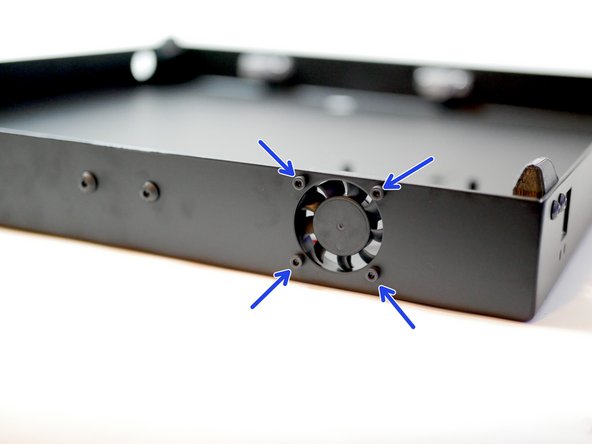 Make sure the sticker side of the fan points inwards.