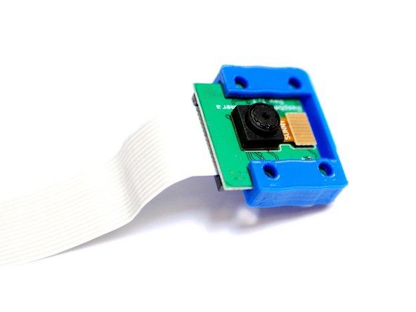 Slide the camera into the 3d printed cover like shown.