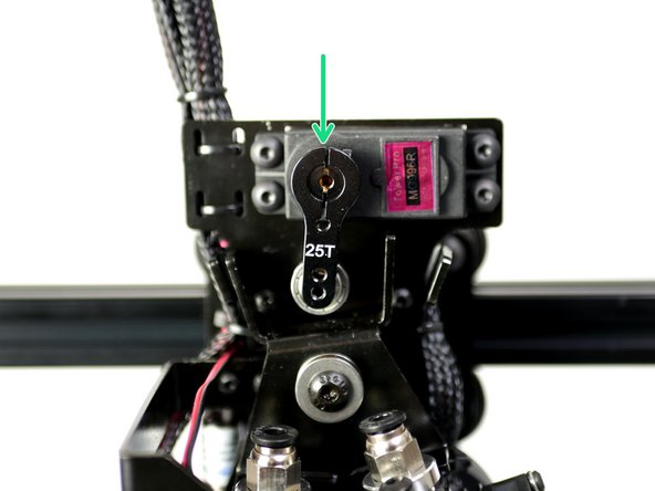 Install the Arm vertically onto the servo gear with the bearing facing down.