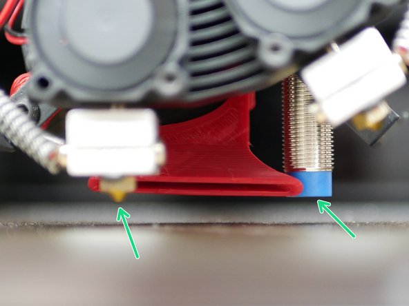 Adjust the probe again, but this time it should sit approx 2mm above the tip of the nozzle.