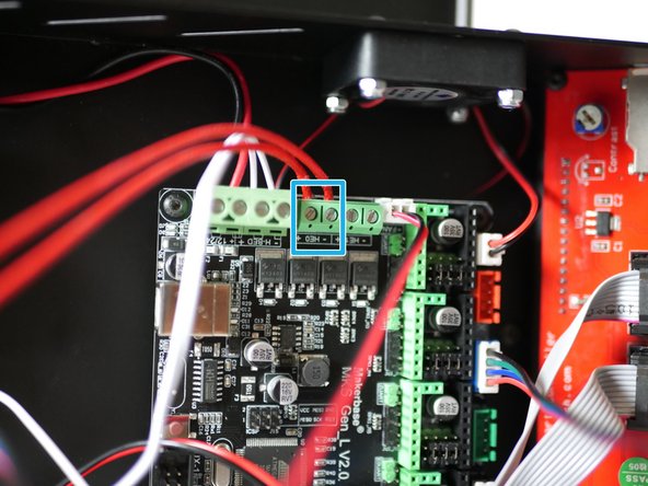 Secure the hotend heater cables to the terminals on the control board.