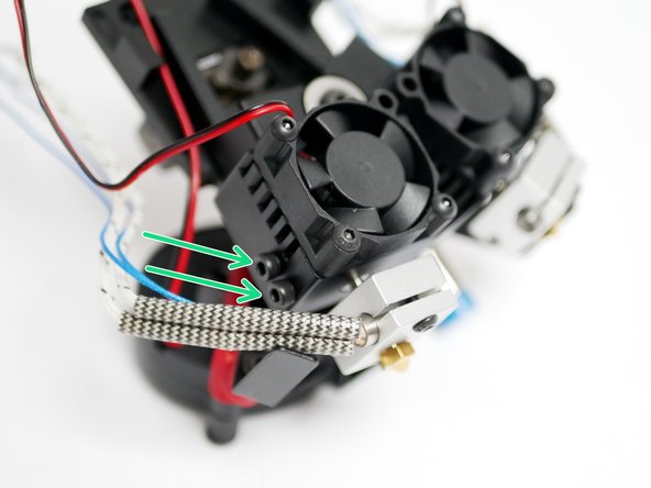 Prepare the heatsink by inserting two M3 x 12mm bolts onto each side.