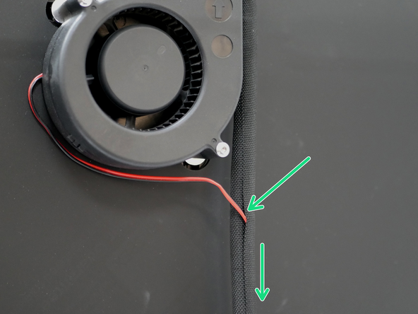Attach to the part cooling fan its extension cable and feed and feed it into the cable sleeving.
