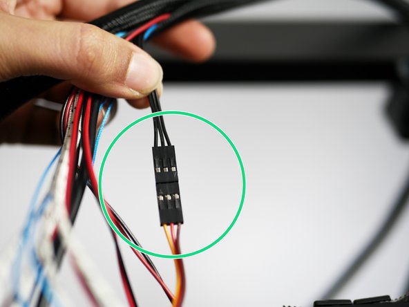 Connect the servo cable to the servo extension cable as shown.