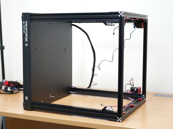 Place the printer to the side again as shown.