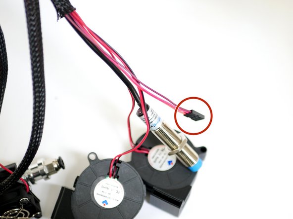 If you haven't already from stage 5 feed the servo cable into the braided cable sleeving with the probe and fans.