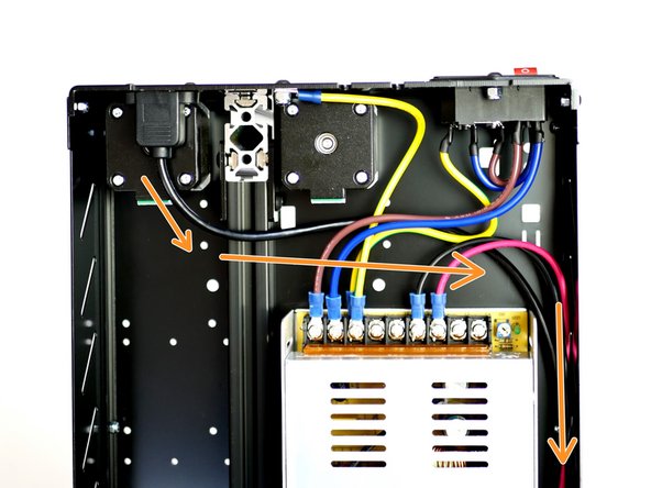Route the cable along the side of the power supply.
