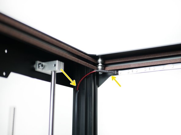 Route the cable down the front right side. Again, use electrical tape to hide and hold the cable in place.