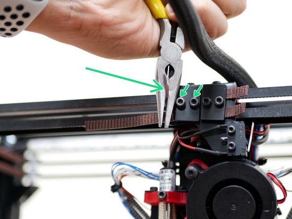 Use a pair of needle nozzle pliers to tighten the belts.