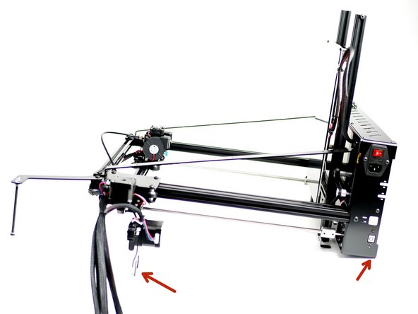 Carefully lay the machine down on its side like shown.