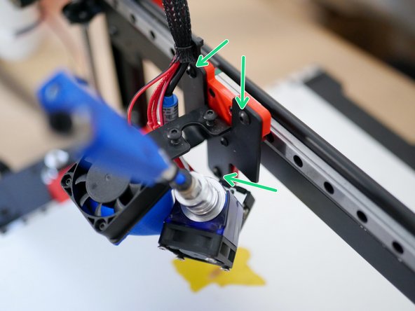 Mount the metal tool carriage onto the 3D printed one with three M4 x 6mm bolts.