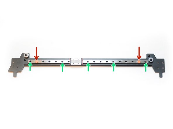 Remove the final rail from its packaging and move the red carriage stoppers inwards one hole space.