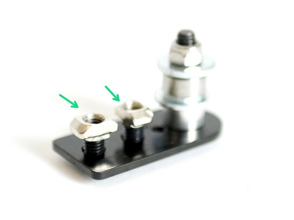 Fix onto the remaing two 5mm holes two M5 x 8mm and M5 T-Nut assemblies.
