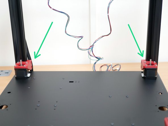 Secure those motor assemblies to the inside rear of the frame as shown.