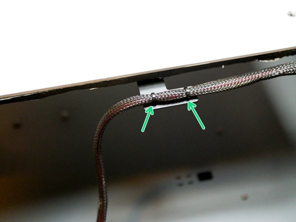 Secure the cables to the cable relief bracket with two cable ties.