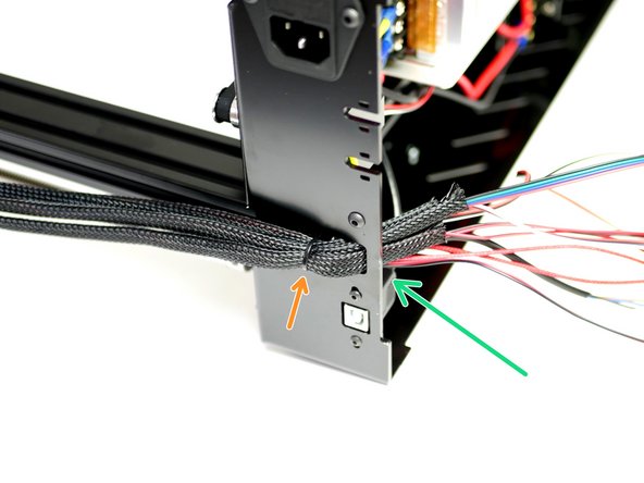 Feed all of the loose cables through the hole on the back of the Base.