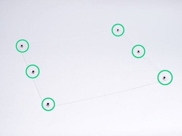 Begin by peeling away the protective covering from both sides of the side panels.