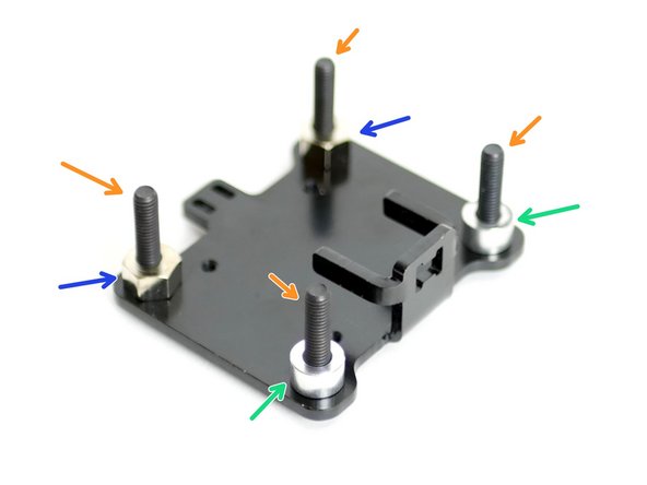 Assemble the tool carriage rollers as shown in the images: