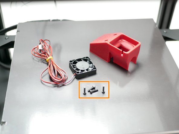 Take the 3D printed mount and remove the support raft from underneath.