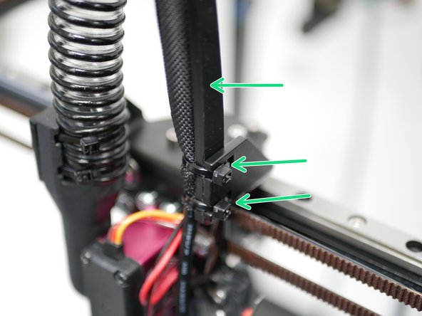 Wrap the cables from the tool carriage into the braided cable sleeving.