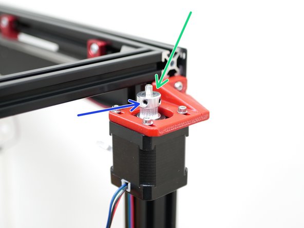 Retrieve the belt pulleys from the top panel assembly.