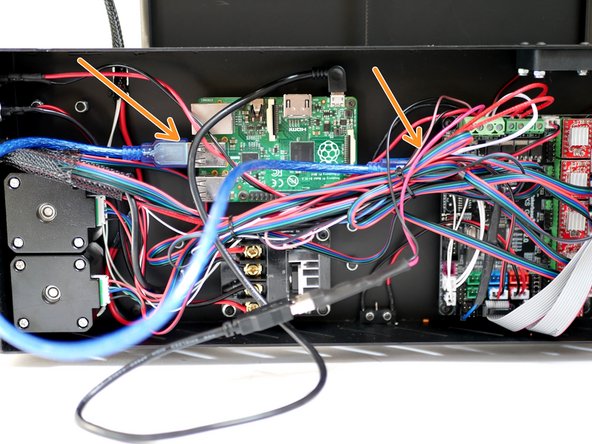 Connect the blue USB cable from the control board to a USB port on the Raspberry Pi.
