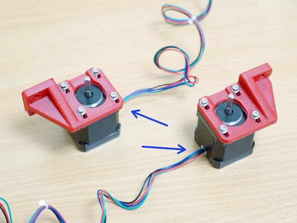 Fix the new X/Y motors to the 3D printed brackets as shown.