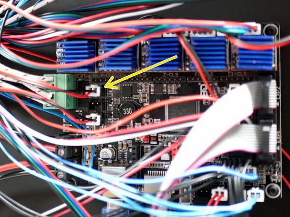 Connect the fan to the control board as shown.