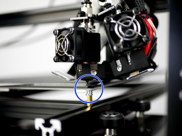 Turn the screw anti-clockwise to raise that corner of the platform.