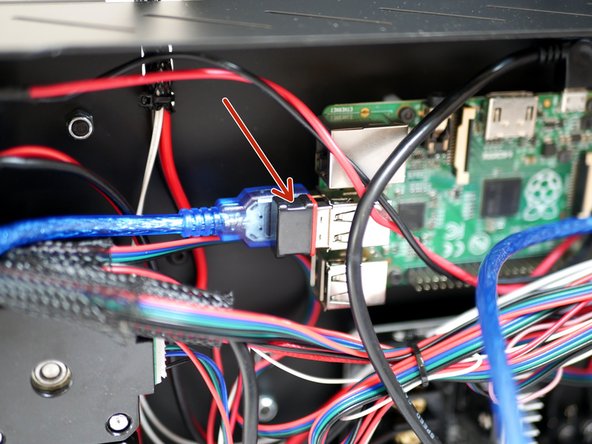 Plug the USB Wi-Fi adapter into one of the USB ports on the Raspberry Pi.