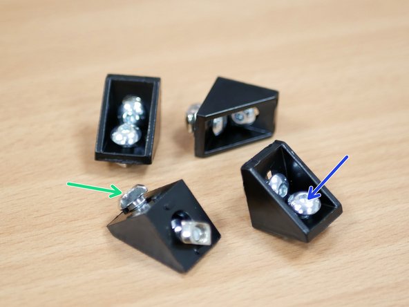 Take four right angle corner brackets and add to them two M5 x 8mm button bolts and M5 T-nuts.