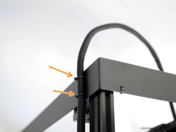 Use cable ties to secure the loom to the rear of the top panel.