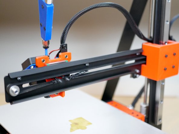 Finally, re-attach the belt and the extruder.