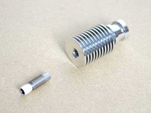 HAND TIGHTEN the Heatsink to the Throat.