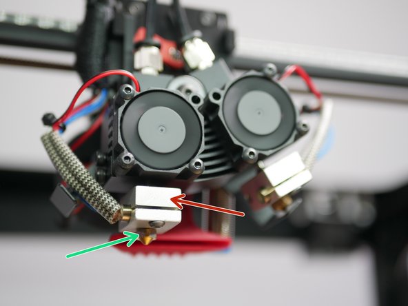 With the hotends hot, tighten the nozzles.