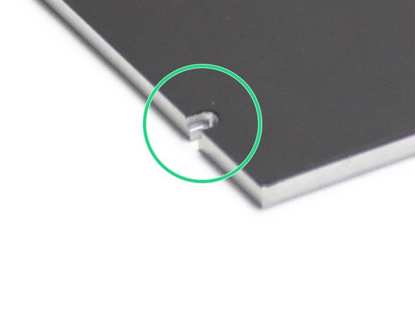 Use a knife to remove the excess magnetic sheet from the platforms mounting slots.