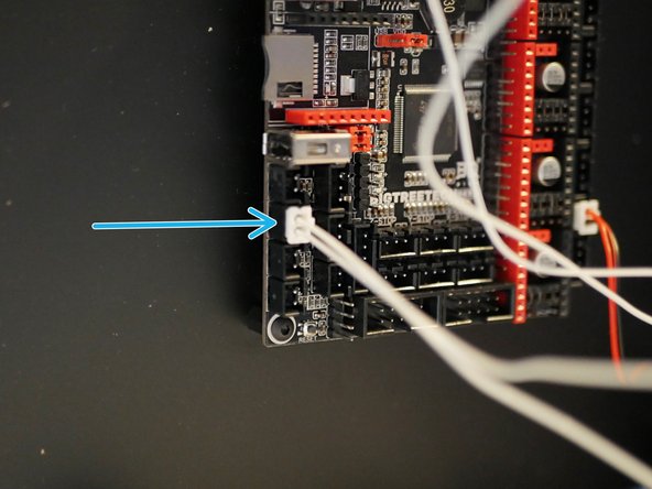 Connect the bed's thermistor to the board in the position shown.